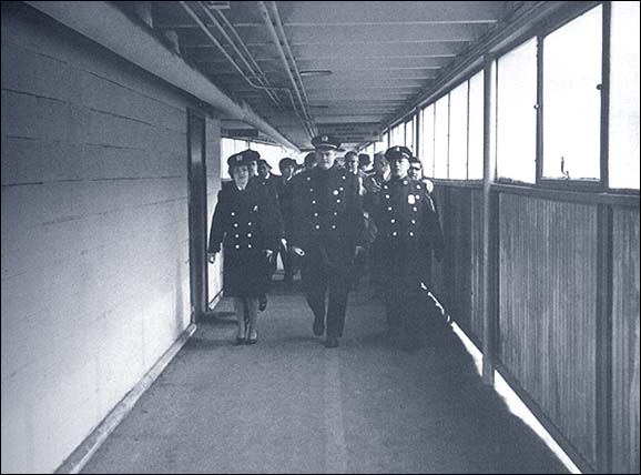 The Beatles Being Led to Customs