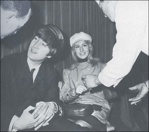 John and Cynthia Lennon at Heathrow Airport