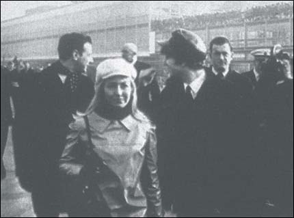 John and Cynthia Lennon at Heathrow Airport