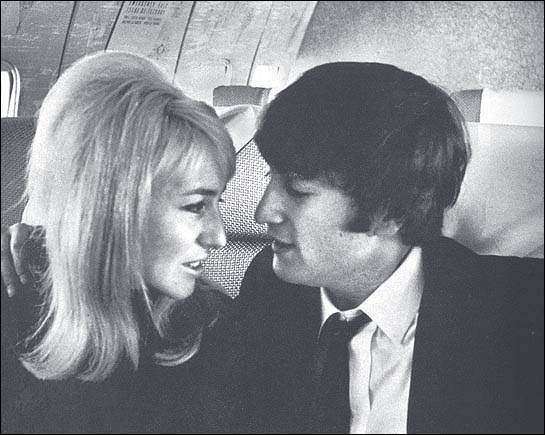 John and Cynthia Lennon on the plane to America