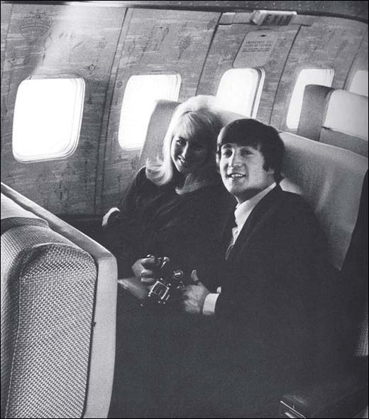 John and Cynthia Lennon on the plane to America