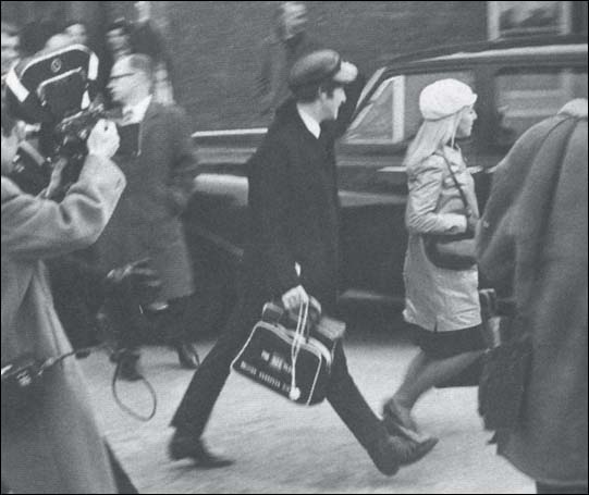 John and Cynthia Lennon at Heathrow Airport