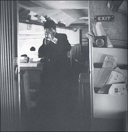 The Beatles on the plane to America